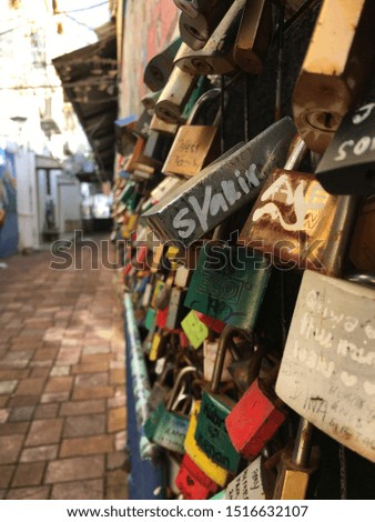 Love locks on a wall.