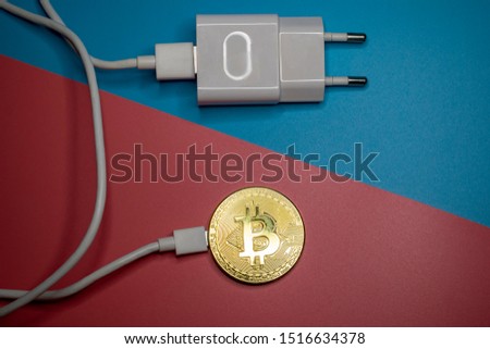 Bitcoin coin with cord and fork for quick money making.