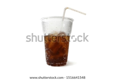 Half glass of cola with ice and curve straw, isolated on white background.