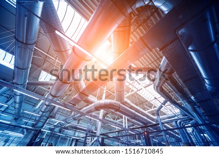 Air conditioning of buildings. Background of ventilation pipes. Laying of engineering networks. Industrial background Royalty-Free Stock Photo #1516710845