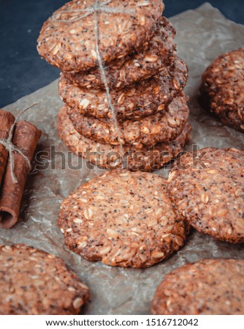 Homemade healthy oat cookies with cinnamon on brown parchment. Healthy food concept. Healthy snack