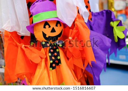Jack O Lanterns pumpkin doll with smiling face. Happy halloween. Orange colors. - holidays, decoration and party concept
