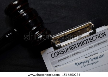 Consumer Protection text on Document and gavel isolated on office desk. Law concept