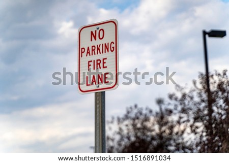 No Parking in Fire Lane Sign at Parking Lot