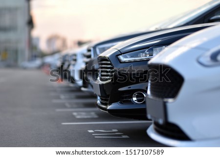 full car outdoor parking in selective focus Royalty-Free Stock Photo #1517107589