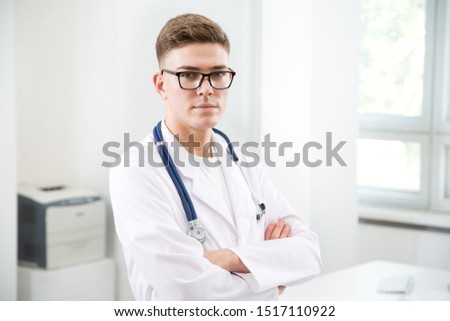 Portrait of young doctor in a clinic