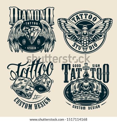 Vintage tattoo studio monochrome badges with butterfly dice royal crown diamond with angel wings isolated vector illustration