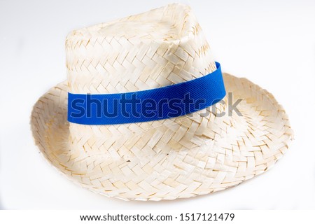 straw hat isolated blue ribbon band on a white background 