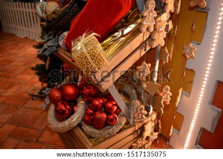 Golden and red baubles. Christmas theme, christmas decoration, presents, gifts in boxes.