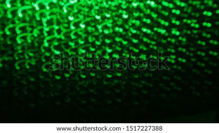Drawing the green light, beautiful abstract blur or the light of green LED. Bokeh background