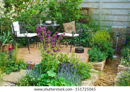 Relaxation area in a garden Royalty-Free Stock Photo #151725065