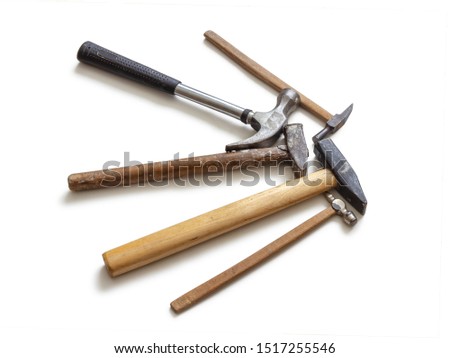 Old hammers of different shapes isolated on white background
