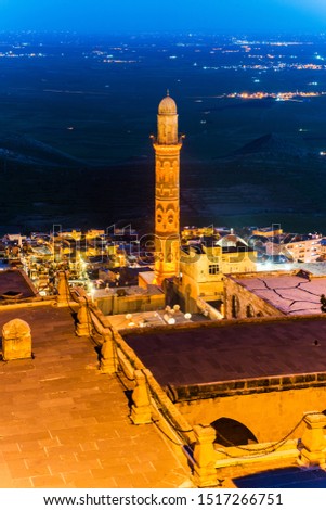 Mardin City in Turkey. Zinciriye Madrasah with Mardin old town and Mesopotamia view.