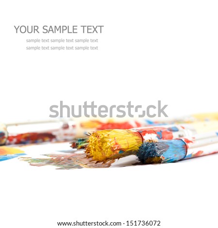 Colorful paints and artist brushes Royalty-Free Stock Photo #151736072