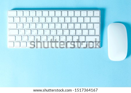 computer keyboard with mouse on the desk