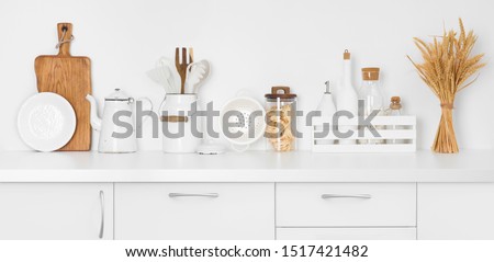 Front view on kitchen counter with baking utensils and ingredients Royalty-Free Stock Photo #1517421482