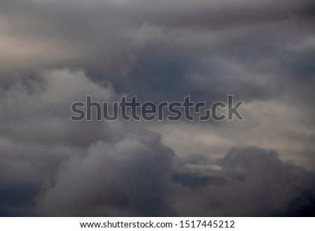 black cloudy sky with dark dramatic cloud background