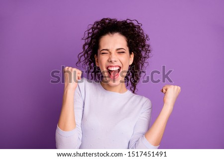 Close up photo of amazing wavy lady win competition yelling raising fists celebrating wear casual pullover isolated purple color background Royalty-Free Stock Photo #1517451491