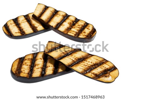 grilled eggplants  isolated on white background. Grilled or fire roasted aubergine