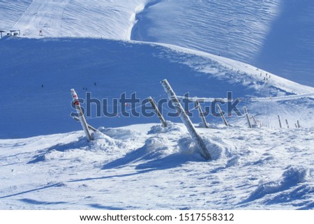 white snow on slope in winter