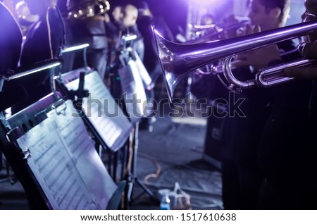 Orchestra music stands. Performance on the stage of a brass symphony orchestra.