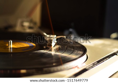 A record player jamming some tunes Royalty-Free Stock Photo #1517649779
