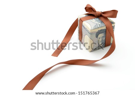 Present box wrapped with Japanese currency