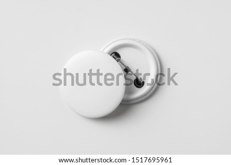 Design concept - top view of 2 front & back white badge isolated on white background for mockup, it's real photo, not 3D render Royalty-Free Stock Photo #1517695961