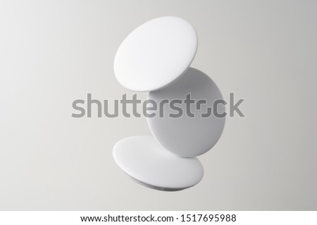 Design concept - top view of 3 white badge float on white background for mockup, it's real photo, not 3D render