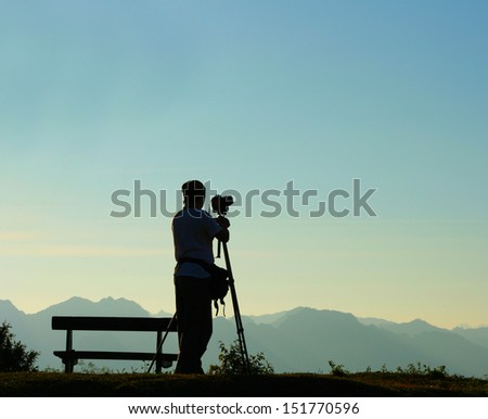 Photographer take a picture on a nature 
