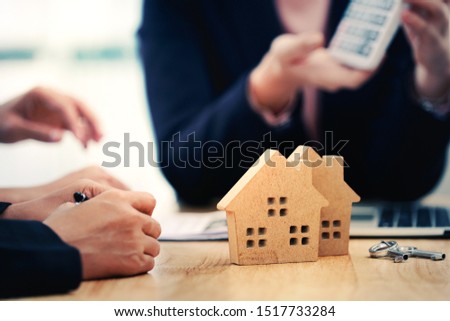 Loan,Contract and residential investment concept. Contract of loan and estate agreement for investor or buyer to sign for getting approval form the bank.                               