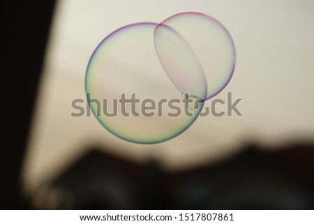 

soap bubbles floating in the air.stock photo of defocused bokeh lights