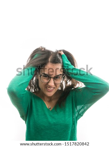 Portrait of a girl with a lot of headache.Photography on white background