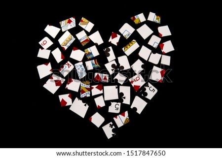 Heart made of pieces of playing cards