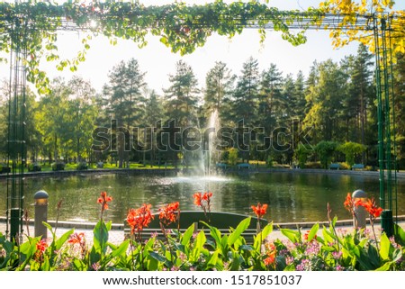 A park in the city center with a pond and a fountain, Kouvola, Finland Royalty-Free Stock Photo #1517851037