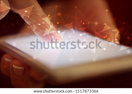 Finger touching phone with human network concept and dark background