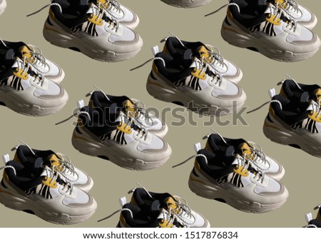 White platform sneakers with bright color accents pattern on brown background. Close View Of Fashion Casual Sneakers with Shoelaces. High Platform Sneakers For Women. Fashion Casual sneakers