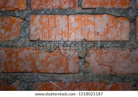 Brick wall with drops of whitewash