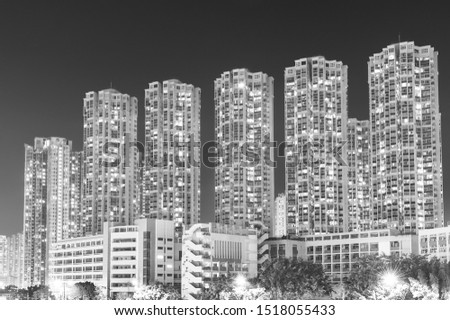 high rise residential building in Hong Kong city at night