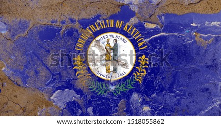 Kentucky grunge, damaged, scratch, old style state flag on wall.
