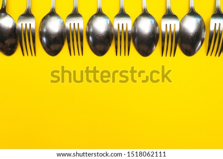 background, frame, texture for artwork, design for menu of restaurant or hotel or for graphic idea. designed from many forks and spoons.
