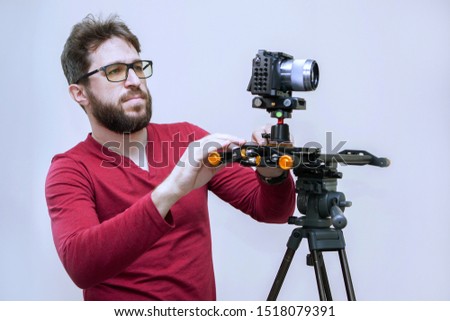Cameraman with a camera on a movie set.