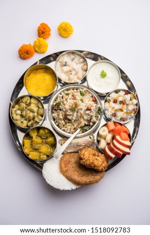 Navratri Upwas Thali / Fasting food platter, selective focus Royalty-Free Stock Photo #1518092783