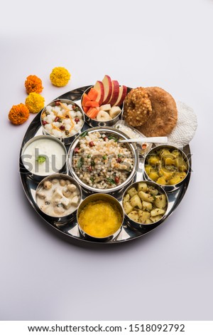 Navratri Upwas Thali / Fasting food platter, selective focus Royalty-Free Stock Photo #1518092792