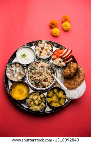 Navratri Upwas Thali / Fasting food platter, selective focus Royalty-Free Stock Photo #1518092843