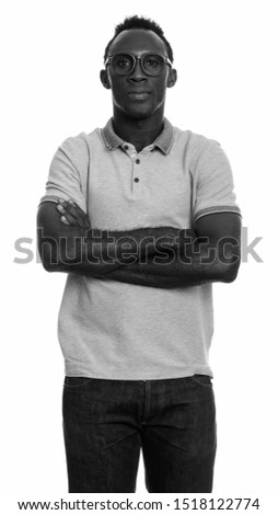 Young black African man with arms crossed