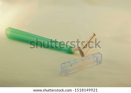 disposable shaving blades on white background close up