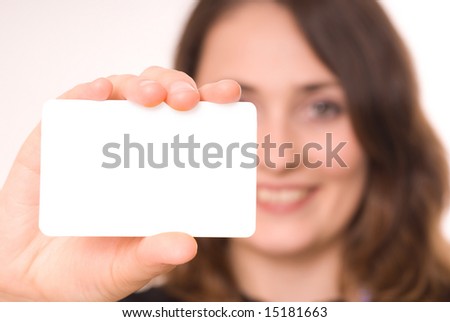 Beautiful woman holding empty gray board