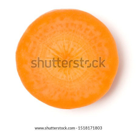 Slice of carrot isolated on white background. Top view, flat lay..