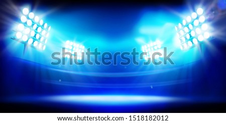 Stadium illuminated by floodlights. Stage on blue background. Abstract vector illustration. Royalty-Free Stock Photo #1518182012